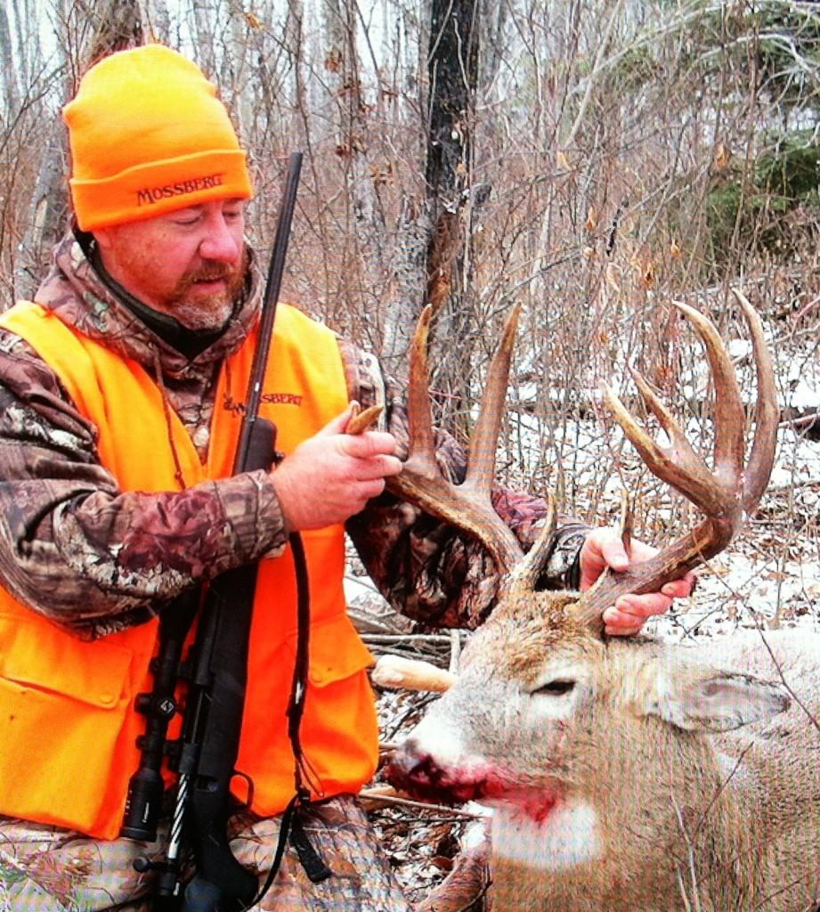 D&DH Managing Editor Alan Clemons with his 143-inch Saskatchewan buck, killed with the Mossberg Patriot chambered in .308. The buck was the first deer killed in North America with the Patriot, which is new for 2015.
